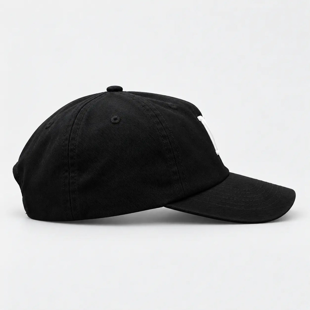 Nonnegotiable Flow black cotton cap, side view