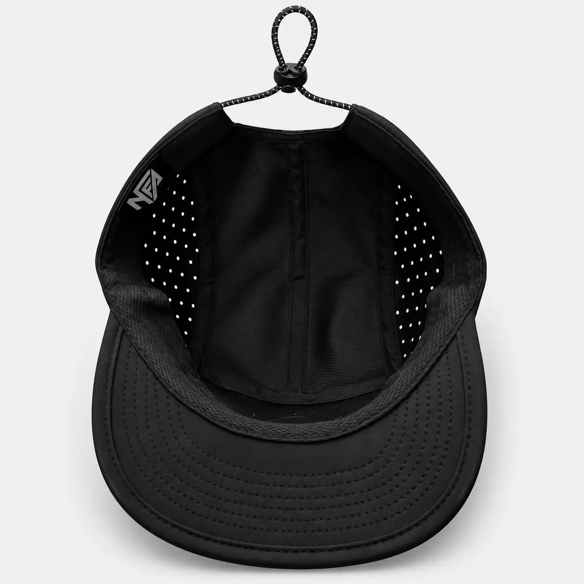 Inside of the Nonnegotiable Flow running cap showing perforations and NFA label